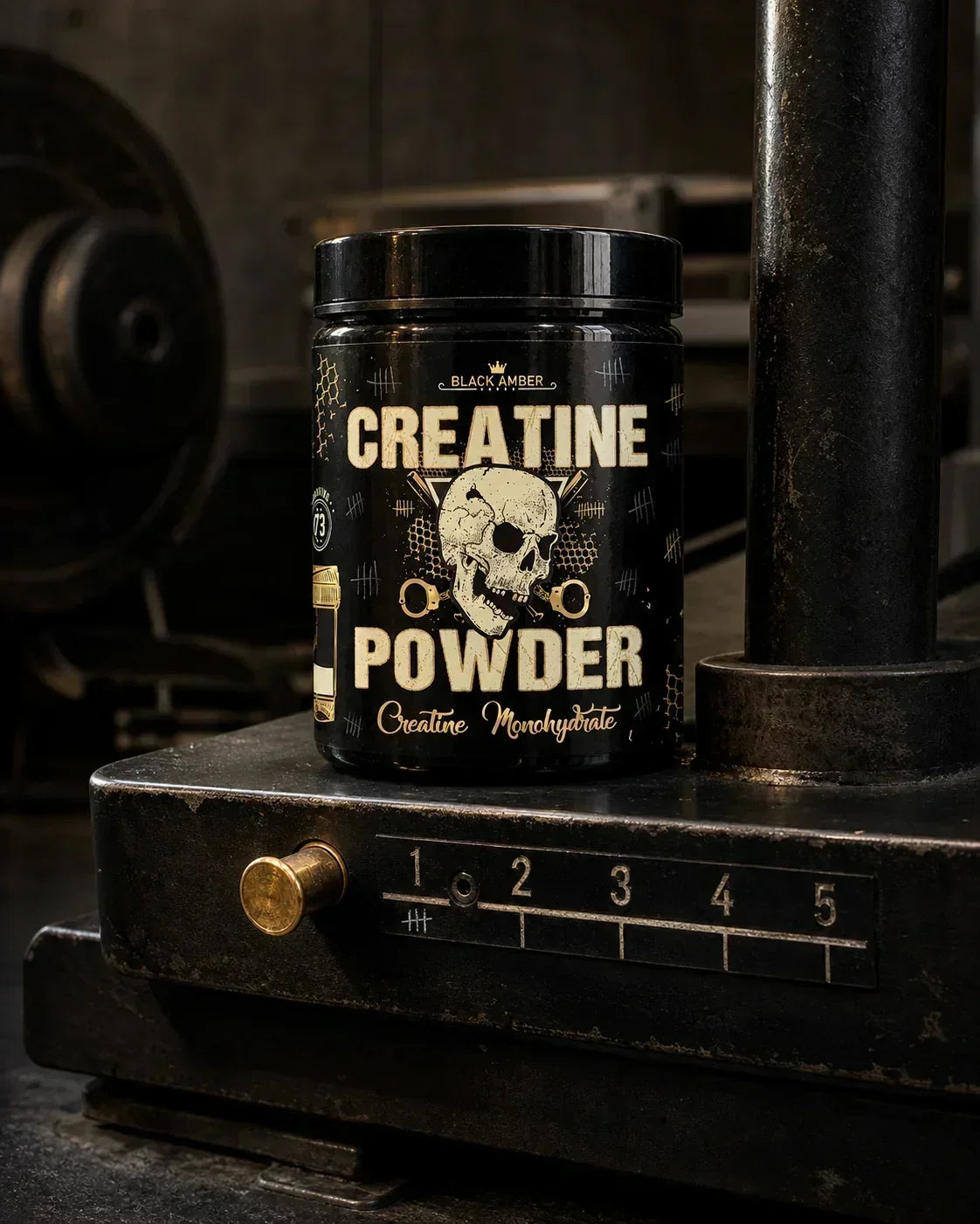 Black Amber creatine monohydrate tub on a steel training platform