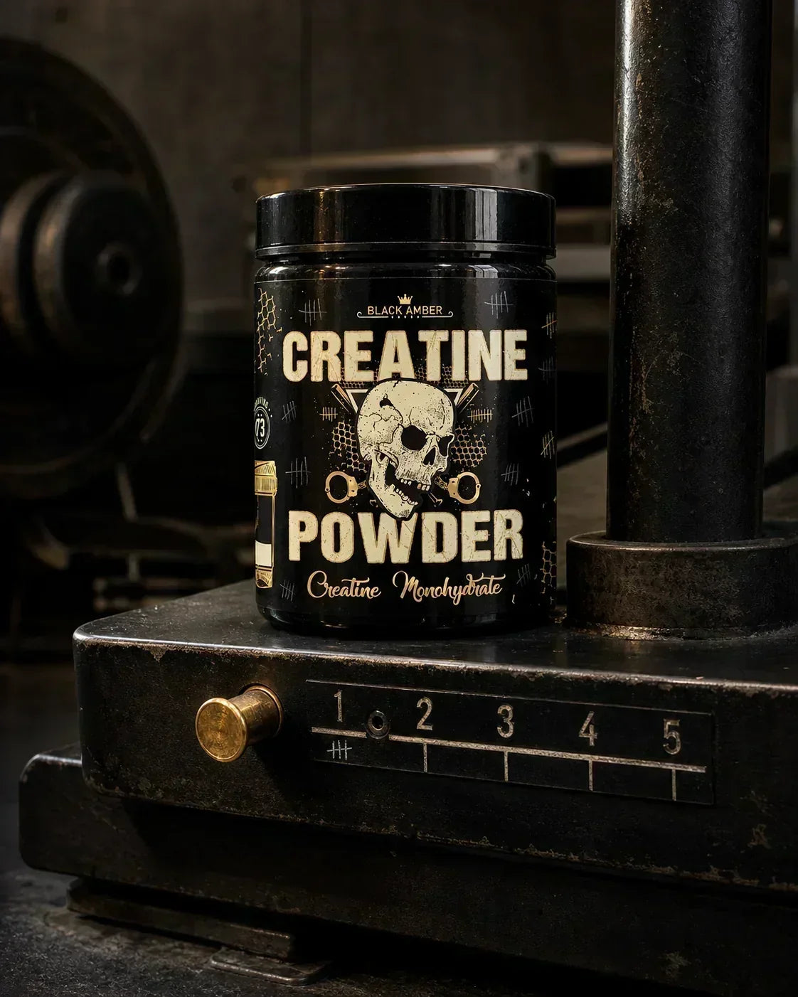 Black Amber creatine monohydrate tub on a steel training platform