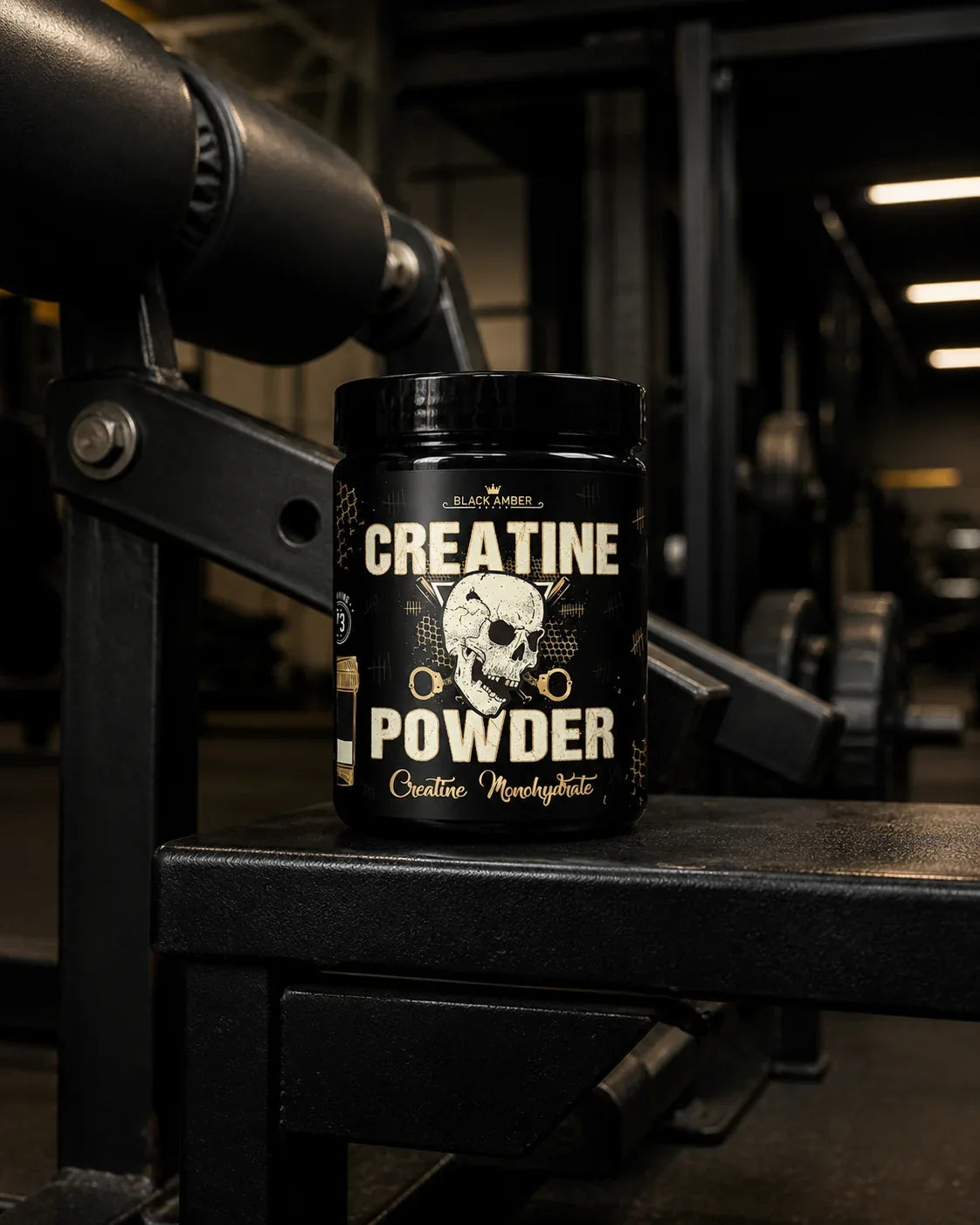Black Amber Creatine Monohydrate tub on a black leg-curl machine footplate