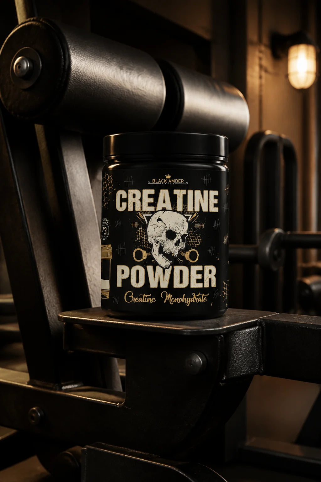 Black Amber Creatine Powder tub on a steel ledge beside black padded gym equipment