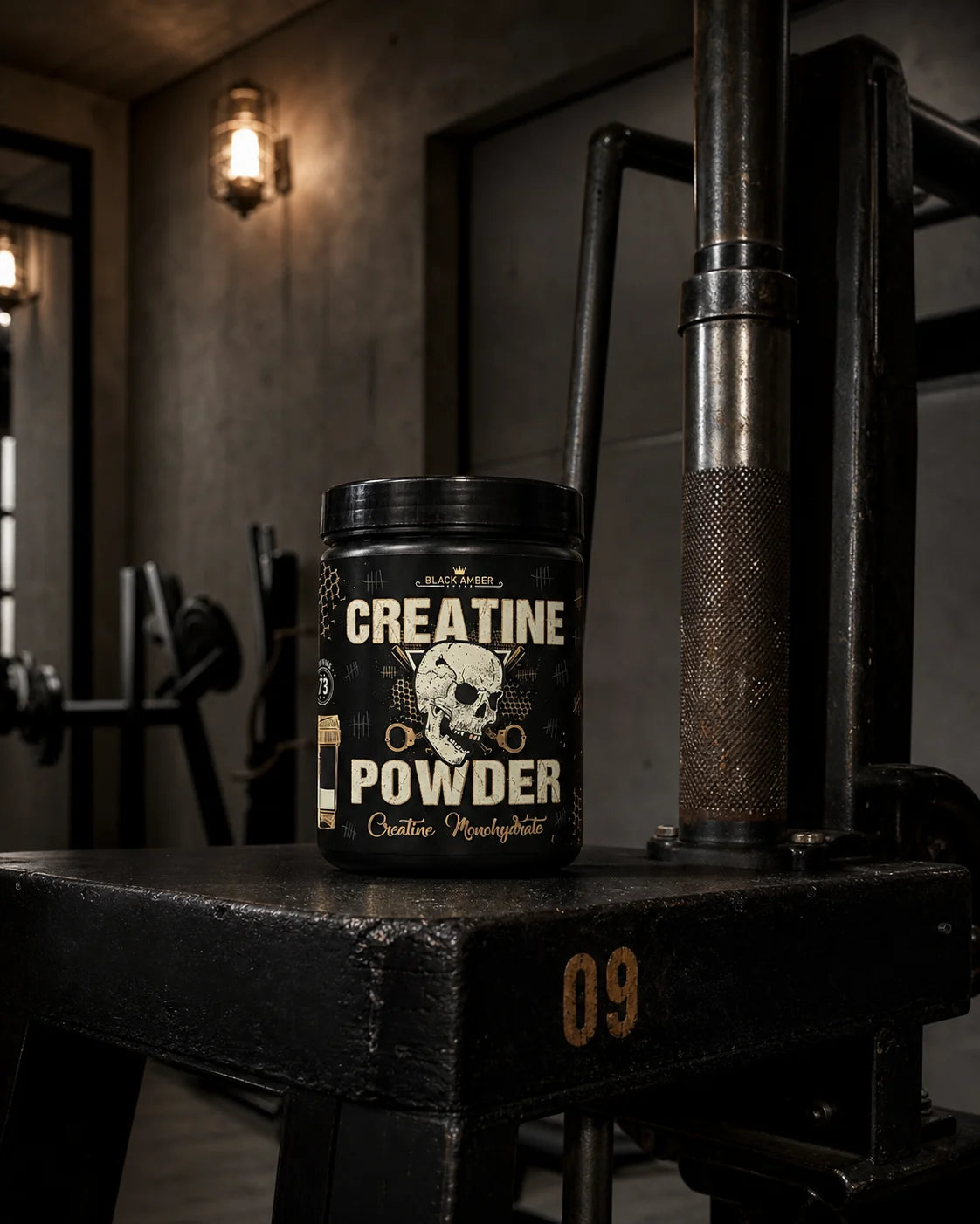 Black Amber Creatine Powder tub on a calf-raise machine base under warm industrial lighting