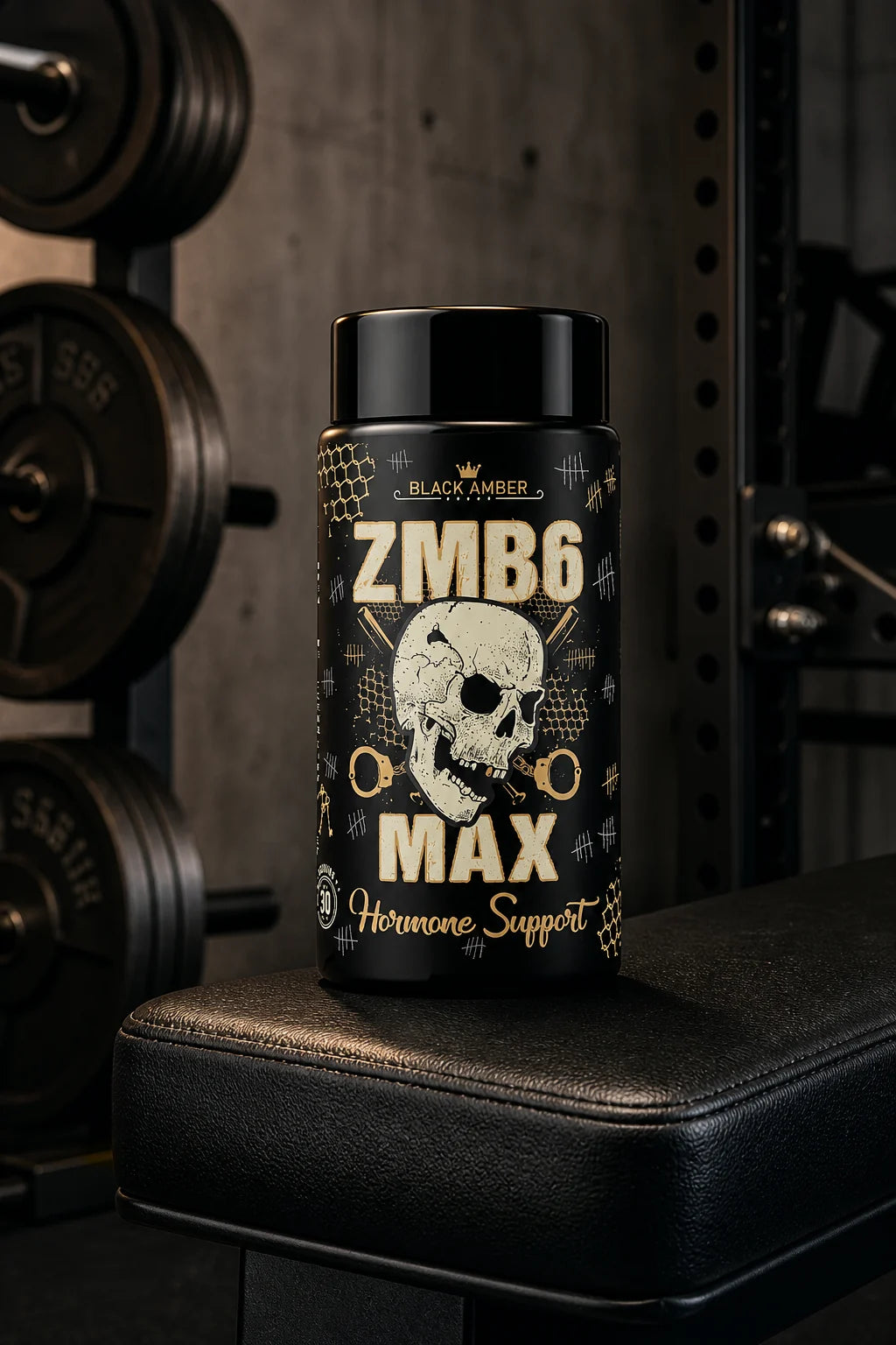 Black Amber ZMB6 Max bottle on a padded incline bench beside an iron weight rack