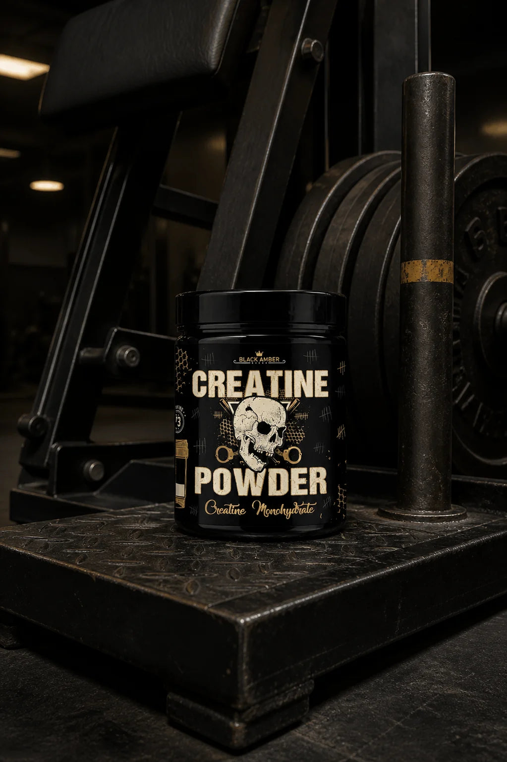 Black Amber Creatine Powder tub on a belt-squat platform beside its steel loading peg