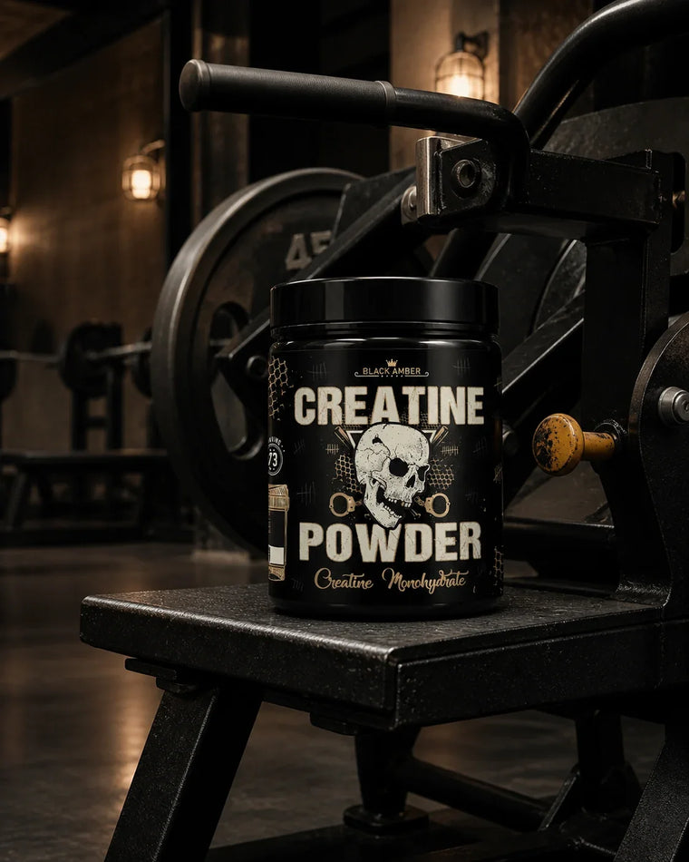 Black Amber Creatine Powder tub on the worn steel platform of a plate-loaded rowing machine