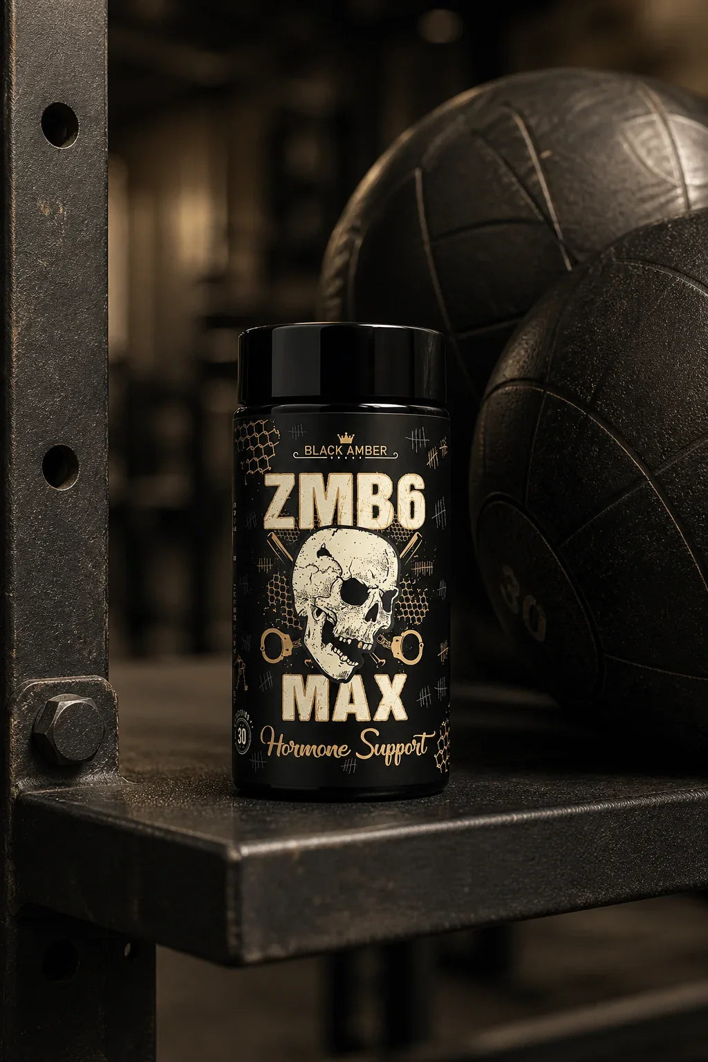 Black Amber ZMB6 Max bottle on a steel shelf beneath textured medicine balls