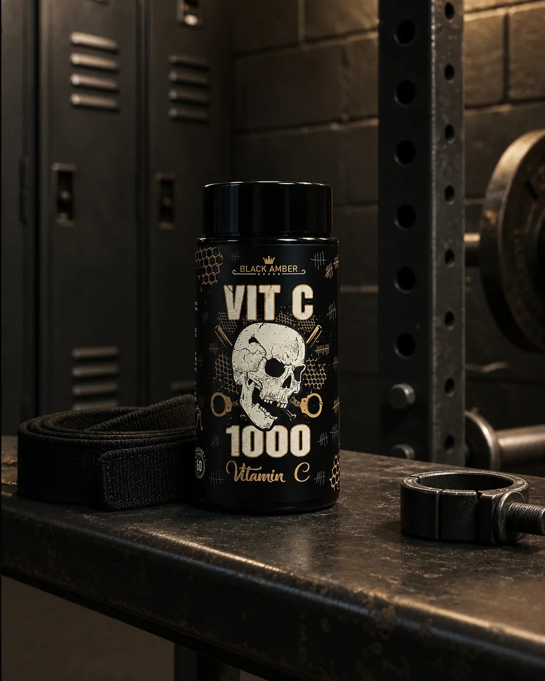 Black Amber Vitamin C 1000 bottle on a locker-room bench beside lifting straps and a collar