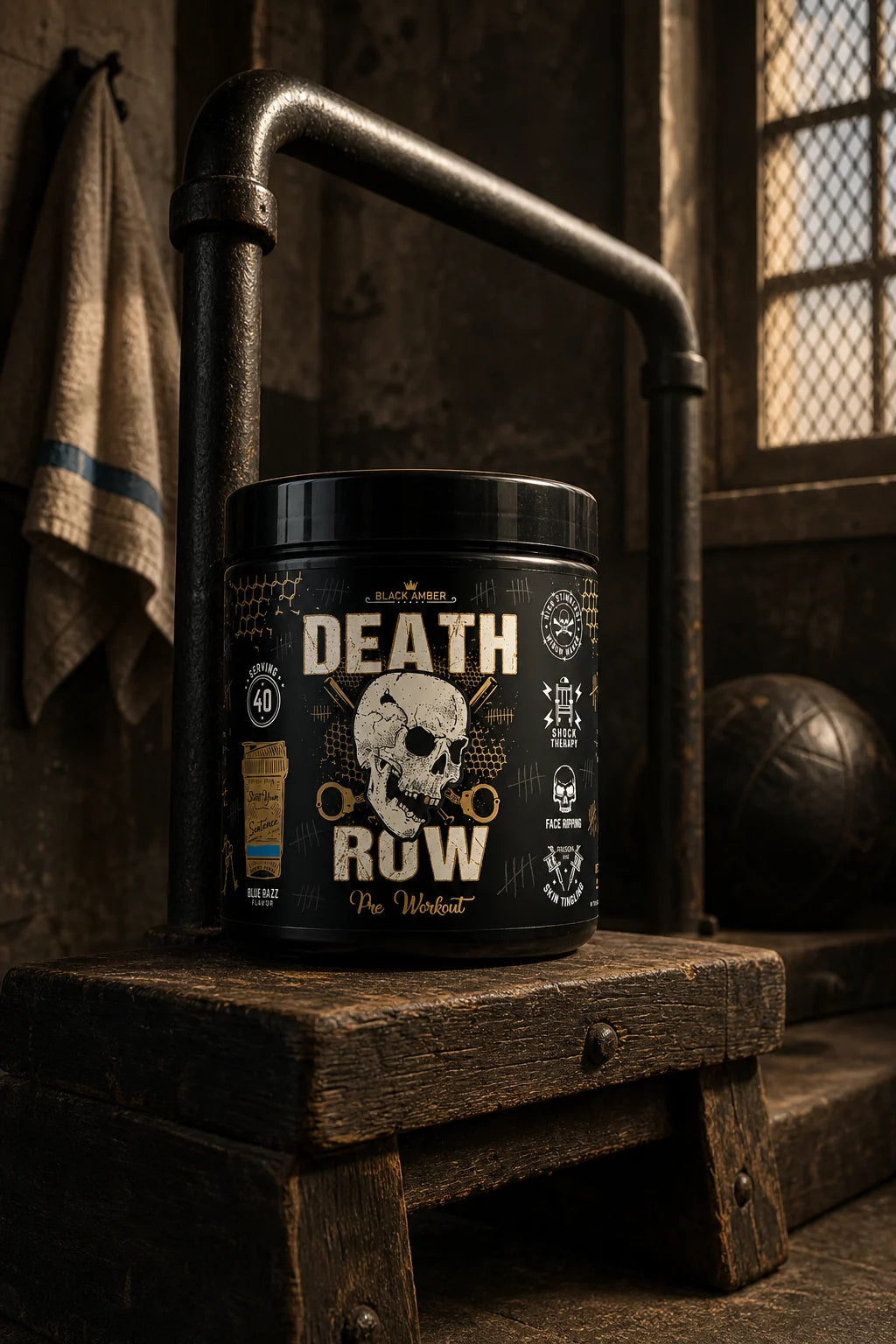 Black Amber Death Row Blue Razz tub on a worn wooden step beside a dip station